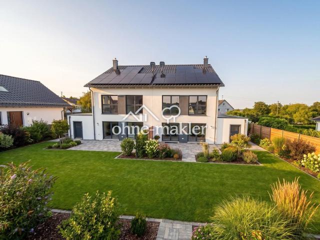 Neubau Doppelhaushälfte in ruhiger Ortsrandlage mit Terrasse und Garten Solar+Speicher+E Mobilität