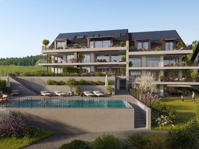 Neubau DORFRESORT 3.5 Zi. Gartenwohnung mit Poolzugang
