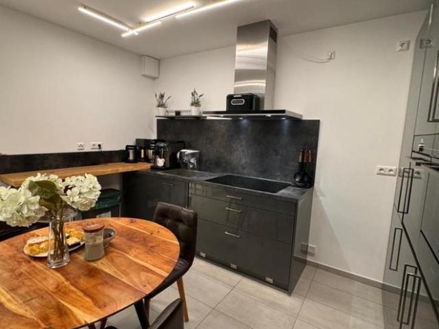 Neubau: EBK, Fußbodenheizung, Balkon & Garten 2,5 Z