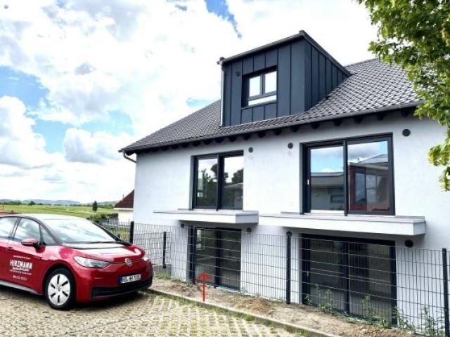 Neubau – EG 2 Zimmer, Ortsrandlage, barrierefrei mit Terrasse und 2 Stellplätzen  Erstbezug