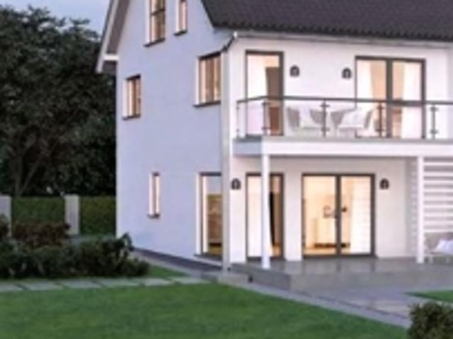 Neubau einer großen Doppelhaushälfte mit ausgebauten Dach, an eine bestehende Hälfte dran