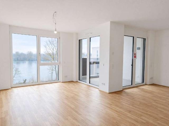 Neubau Erstberzug 3 Zimmer Traumwohnung mit Balkon und Einbauküche im Rhein Quartier!