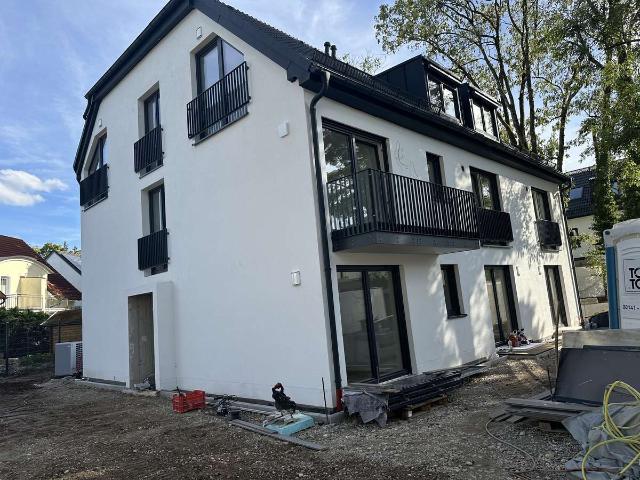 Neubau Erstbezug mit Garten und großer Terrassen