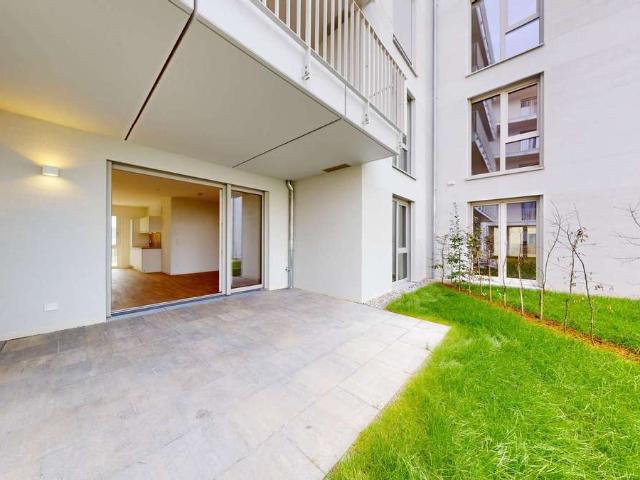 NEUBAU ERSTBEZUG: 2 ZIMMER GARTENWOHNUNG MIT EINBAUKÜCHE