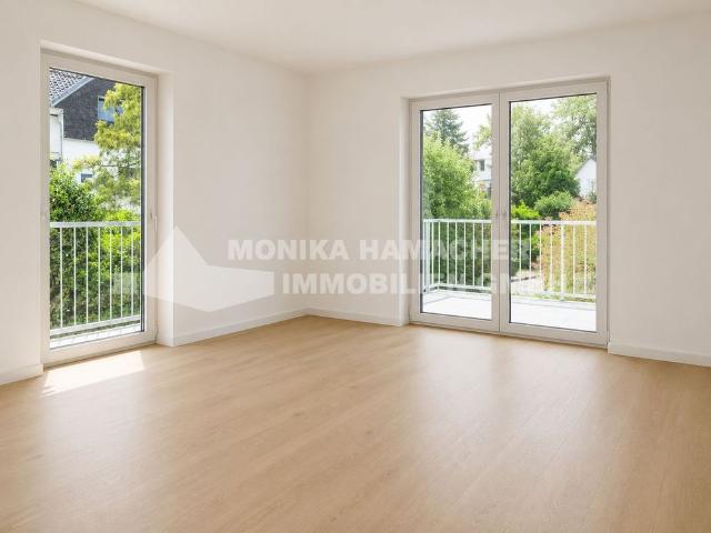 Neubau im Milchborntalweg! 3 Zimmerwohnung im Souterrain mit Terrasse und Garten