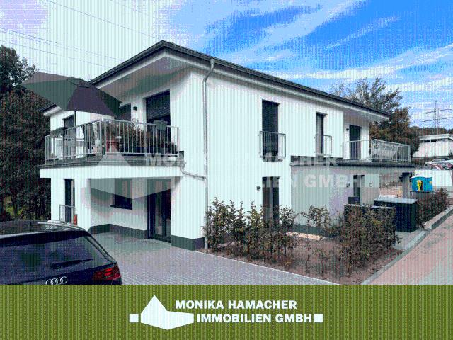 Neubau im Milchborntalweg! 3 Zimmerwohnung im Souterrain mit Terrasse und Garten