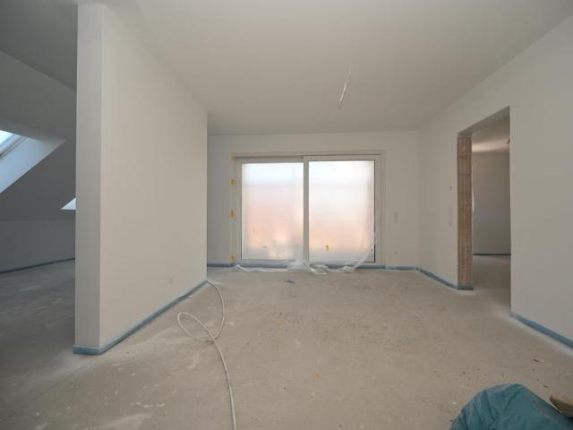 NEUBAU oberste Etage mit tollem Ausblick!