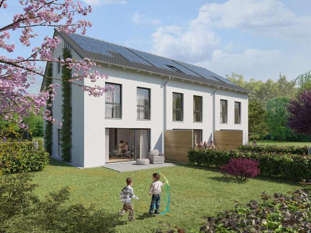 Neubau Reihen Mittel Haus mit Wohlfühleffekt: neues Zuhause inmitten der Stadt