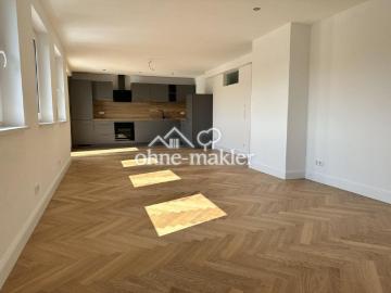 Neubaujuwel in Südlage: Exklusive 75 m² Wohnung mit Fernblick ins Grüne