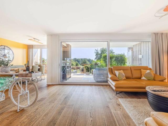 Neubaukomfort mit Gartenidylle hochwertige 3.5 Zimmer Gartenwohnung direkt angrenzend an die Landwirtschaftszone
