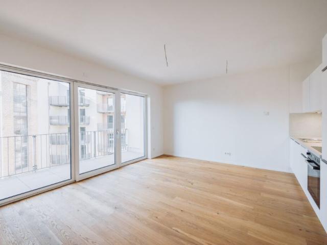 Neubaukomfort: Stilvolle 1 Zimmer Wohnung mit Einbauküche und Balkon