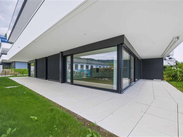 Neue Luxuswohnung – 5,5 Zimmer in der Ecke mit Terrasse und privatem Garten