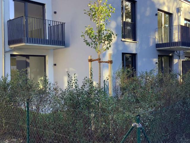 Neue 2 Zimmerwohnung mit kleinem Garten, EBK und Wallbox