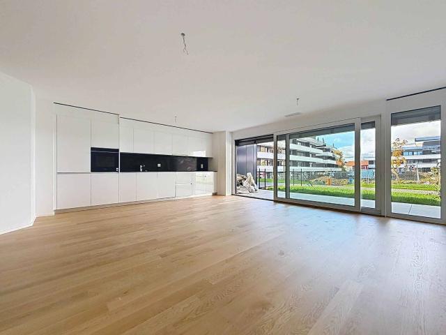 Neue 3,5 Zimmer Wohnung mit 2 Reihenhäusern und 2 Gärten