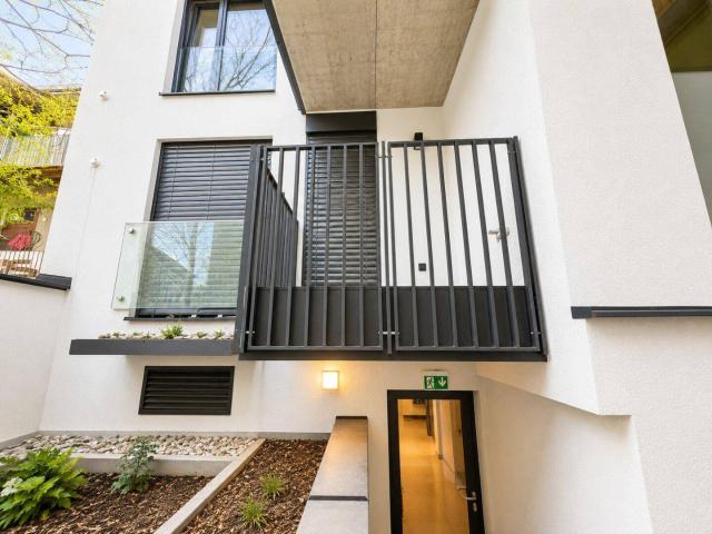 Vermietete Anlageobjekte / 4% Rendite/ 2 Zimmer Neubauwohnung mit Balkon, Eigengarten & Klimaanlage