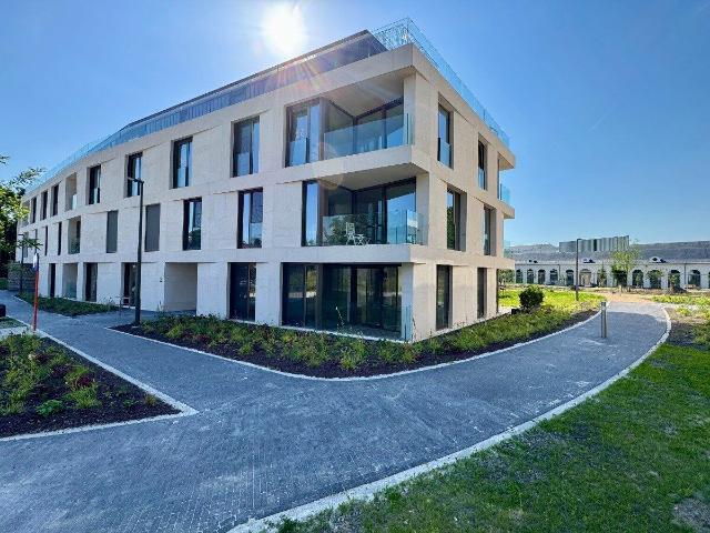 New build apartment with terrace and unique pond view