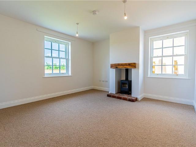 New Leys Farmhouse is a newly constructed, high quality energy efficient rural residence set within an attractive countryside location near Denford village. The property combines modern living standards with traditional farmhouse appeal with equestrian facilities