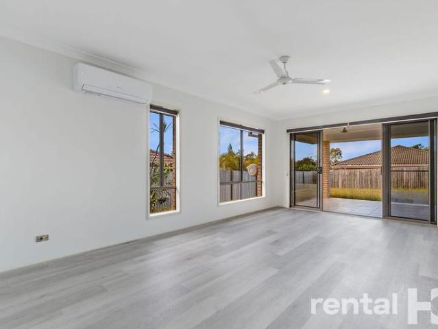 New Paint & Flooring, Two Living Areas & Rare Side Access