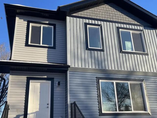 Newer 3 bedroom 3.5 bathroom with a rear parking spot in Allendale