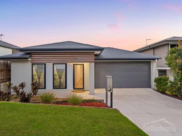 Newer Build, Two Living Areas and Low Maintenance Appeal
