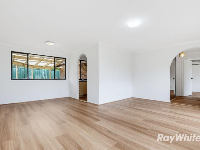 NEWLY UPDATED HOME WITH 2 GARAGES WALK TO STATION & SHOPS