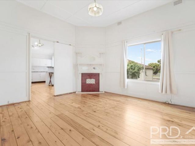 NEWLY UPDATED TWO BEDROOM HOME PLUS STUDY AND SUNROOM