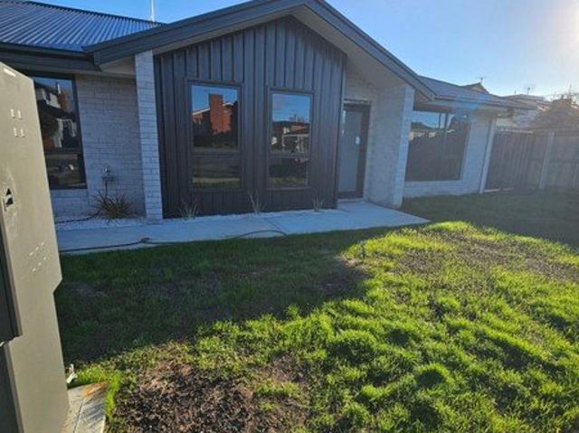 newly built 2 bedroom unit located walking distance from main street