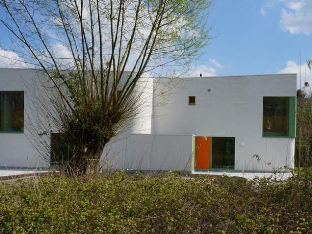 Newly built house with garden bordering nature reserve