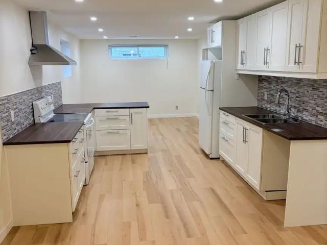 Newly Renovated 2 Bed 1 Bath Basement Suite w/ Den