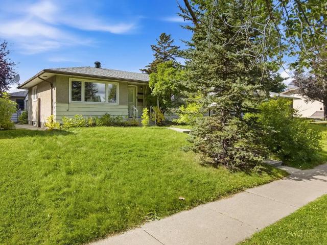 Newly Renovated 5 Bedroom Home with Oversized Garage in Desirable Fairview