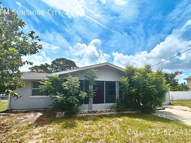 NEWLY RENOVATED CANAL FRONT HOME ON DOUBLE LOT WITH BOAT LIFTS & MANGO TREES!