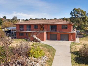 Newly Renovated Brick Family Home Nestled on Beautiful Acreage