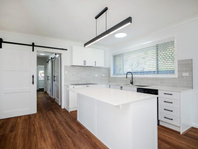 NEWLY RENOVATED DUPLEX HALF WITH NO INTERNAL COMMON WALL