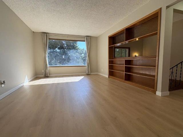 Newly Renovated Entire Half Duplex With Character & Optional Double Garage — 4 Bedrooms+ Den Duplex
