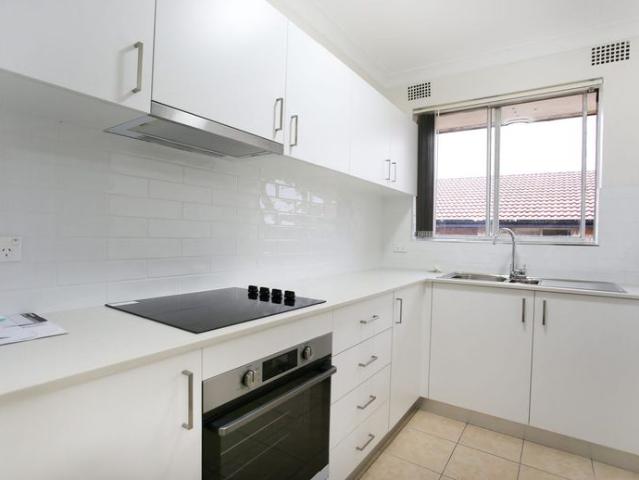 NEWLY RENOVATED TOP FLOOR TWO BEDROOM APARTMENT