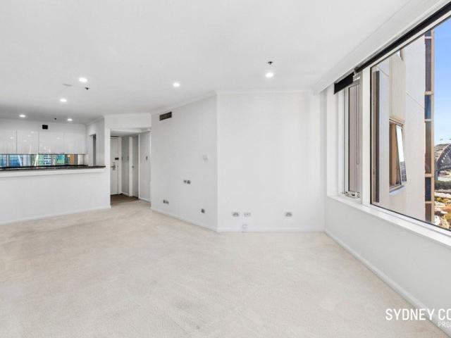 NEWLY REFRESHED QUAY WEST APARTMENT WITH ICONIC HARBOUR BRIDGE VIEWS