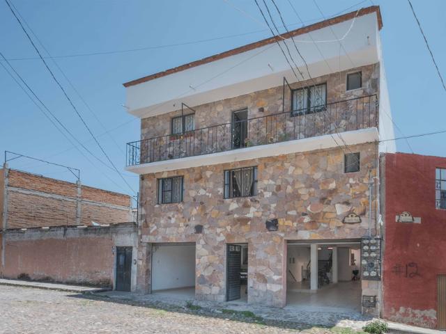 Nine unit apartment building with varied layouts—ideal for investment