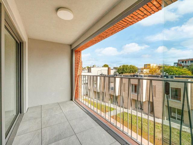 Nieuw appartement met 2 slaapkamers, terras en staanplaats