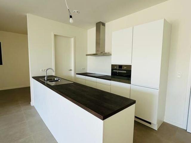 Nieuw gelijkvloers appartement met tuin en garage