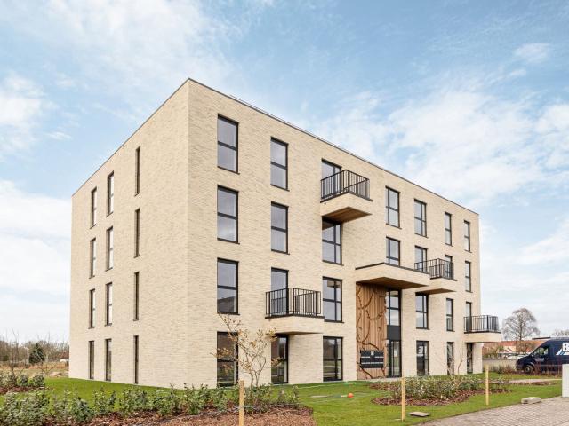 Nieuwbouwapp. met 3 slpks en terras met zicht op het groen