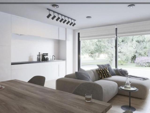 Nieuwbouwappartement met 2 slpk, 2 terrassen en ondergrondse garage voor 1.000 EUR/mnd in Residentie Klarenhof, een Unicum in Eeklo