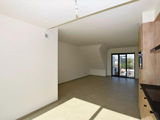 Nieuwbouwappartement met één slaapkamer en een ruim Z terras te Broechem!