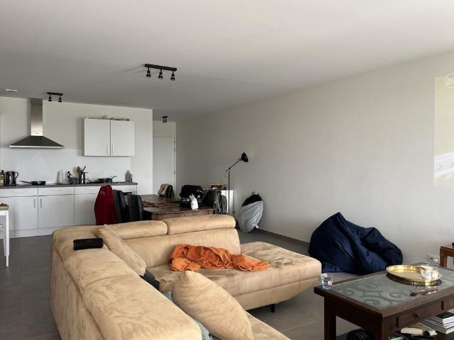 Nieuwbouwappartement met twee slaapkamers en ondergrondse parkeerplaatsen te Brugge
