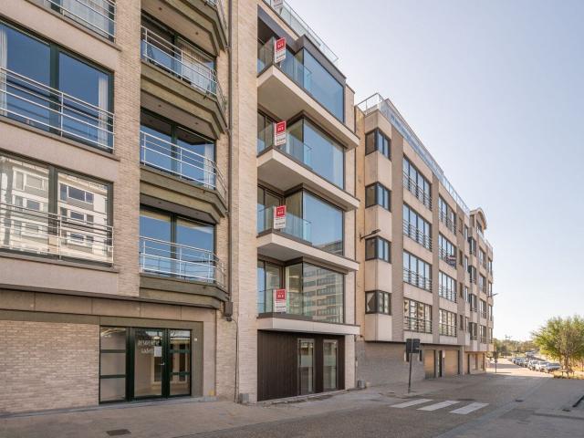 Nieuwbouwappartement met zeezicht en terras aan het Vissersh