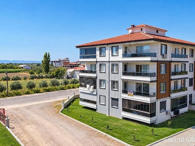 NO:10DAN SİTE İÇERİSİNDE SAHİL YOLUNDA ARA KAT ÇİFT BALKONLU YERDEN ISITMALI LÜKS 3+1 DAİRE