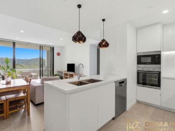 North West facing Corner Apartment with 2 Car Spaces & Spectacular Sunsets