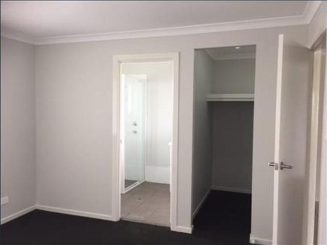 North aspect 210m2 construction size with 4 beds plus study 2 cars garage