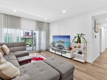 North East Facing Apartment with Full Width Balcony Access from Living and Bedrooms