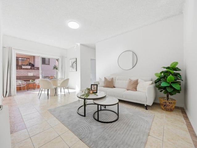 North East Facing Double Brick Gem with Lock Up Garage, steps to Train Station