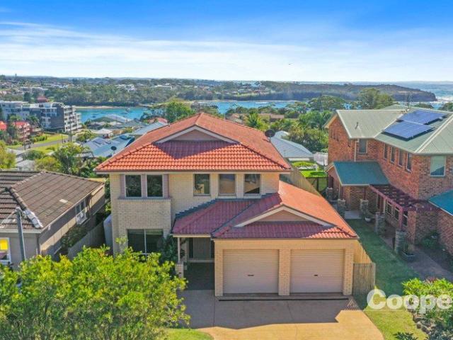 North Facing Coastal Living with Ocean Views & Walk to Town Ease